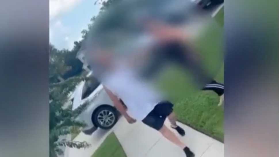 Couple Charged After Viral Racist TikTok Incident Targeting Door-to-Door Salesman